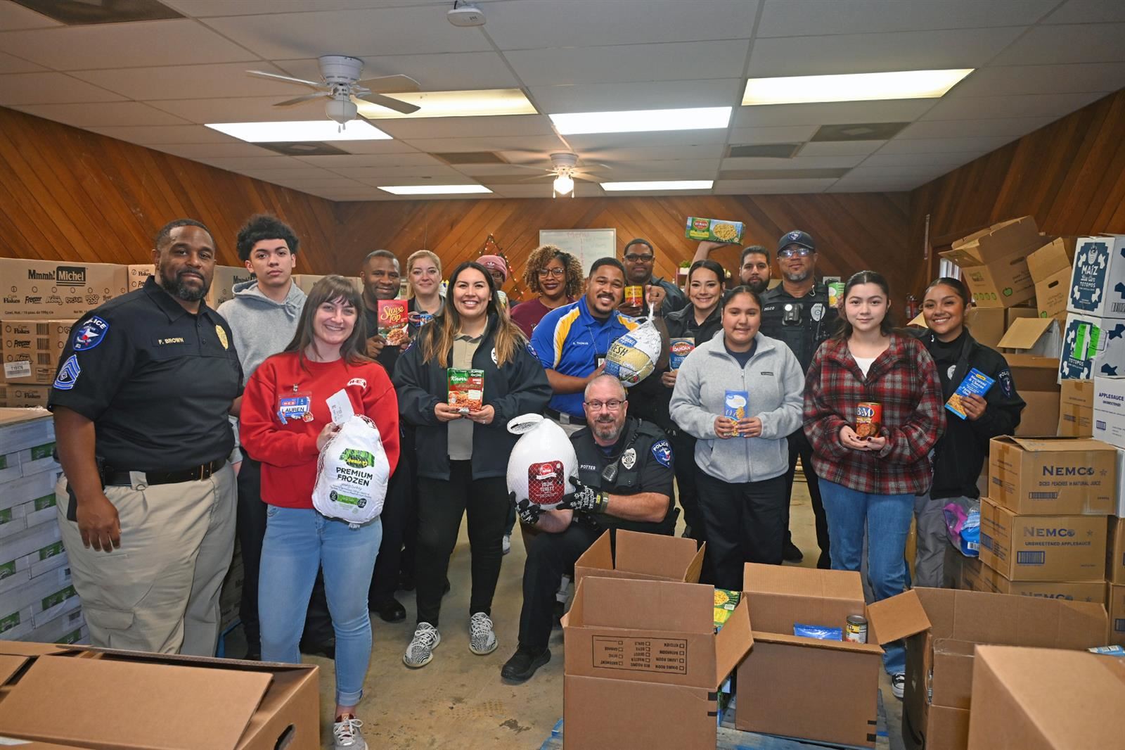 CFISD police officers deliver Thanksgiving meals to families.